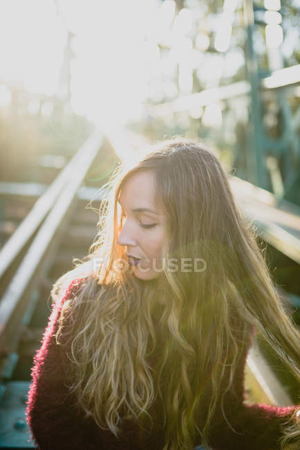 Girl posing on bridge. — Stock Photo