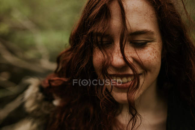Sensual ginger girl with closed eyes and smiling — Stock Photo
