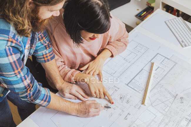 High angle view of two architects discussing the plan — Stock Photo