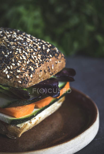 Vegan burger with delicious tofu on rustic background — Stock Photo