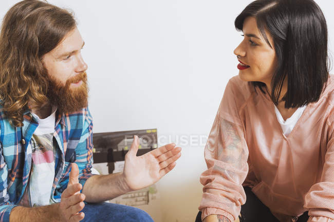 Colleagues sitting together and discussing — Stock Photo