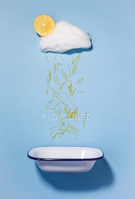 Cotton candy cloud with pasta rain — Stock Photo