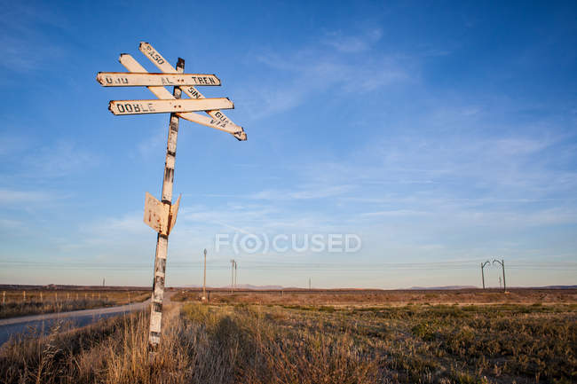 Railroad crossing sign at countryside — Stock Photo