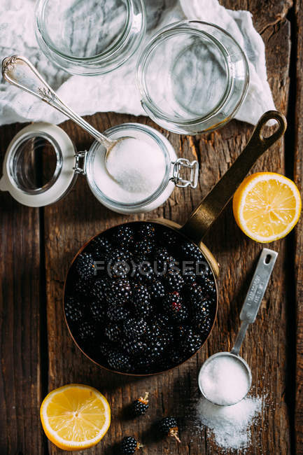 Jam ingridients on wooden table — Stock Photo