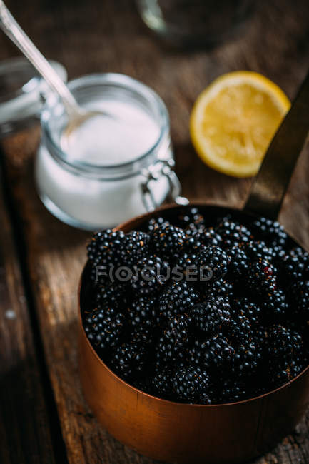 Jam ingridients on wooden table — Stock Photo