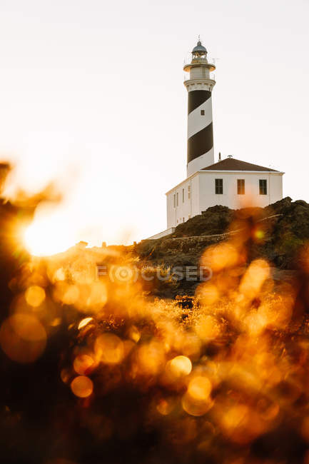 Faro in morbida luce del tramonto — Foto stock