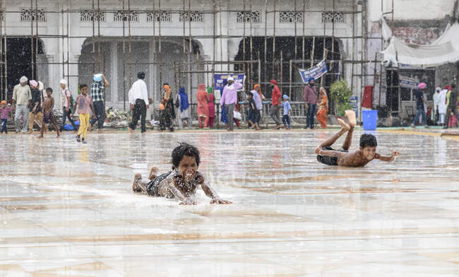 Children having fun in city — Stock Photo