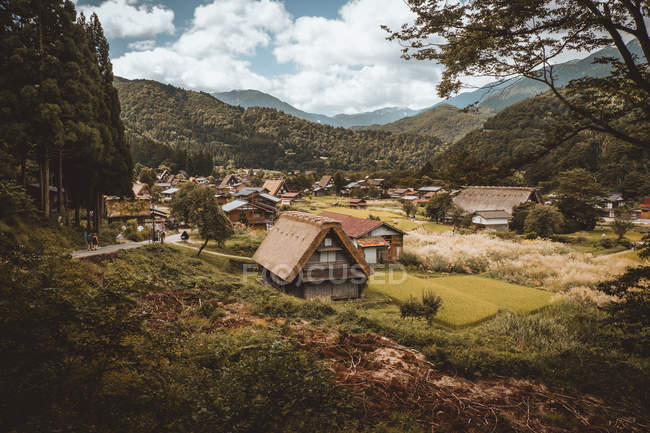 Landscape of small village placed in mountain valley — Stock Photo