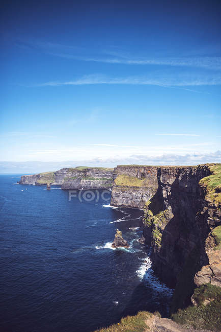 Massive cliffs of Moher on Atlantic coastline — Stock Photo