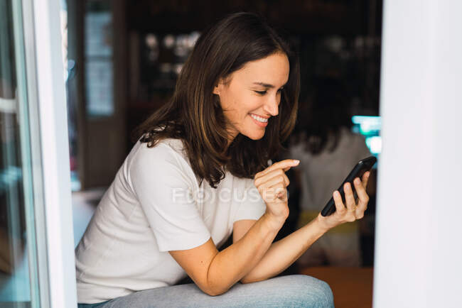 Pretty woman taking selfie at home — Stock Photo