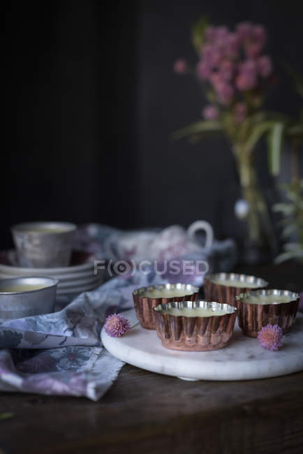 Sweet rustic desserts on wooden table — Stock Photo
