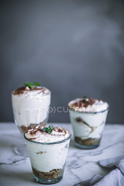 Close up view of sweet panna cota desserts on table — Stock Photo