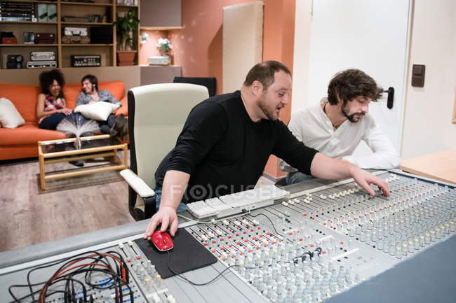 Sound directors working in recording studio — Stock Photo