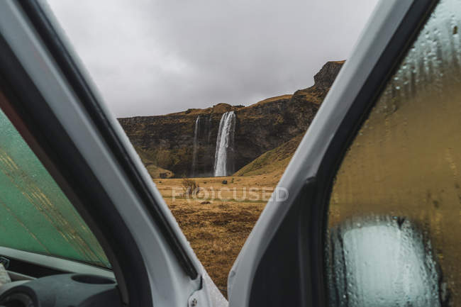 Huge waterfall from vehicle — Stock Photo