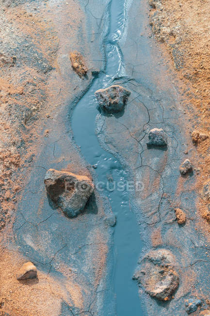 Streaming soil with sulfur — Stock Photo
