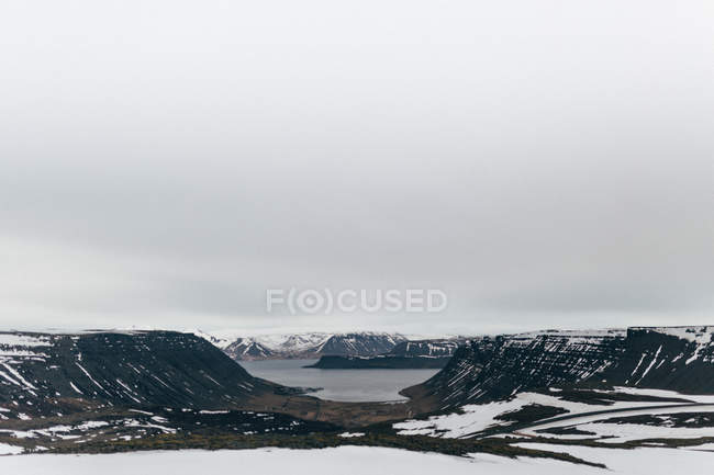 Valley with lake in mountains — Stock Photo