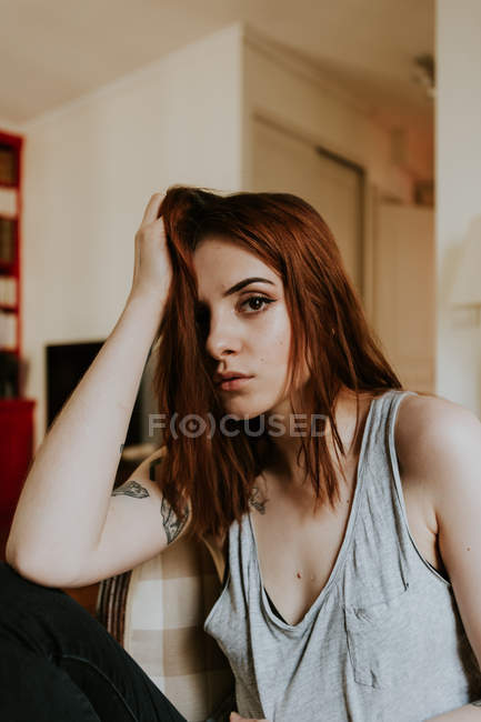 Woman leaning on hand — Stock Photo