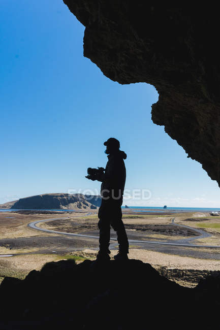 Photographer taking picture of landscape — Stock Photo