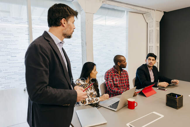 Office team in meeting room — Stock Photo