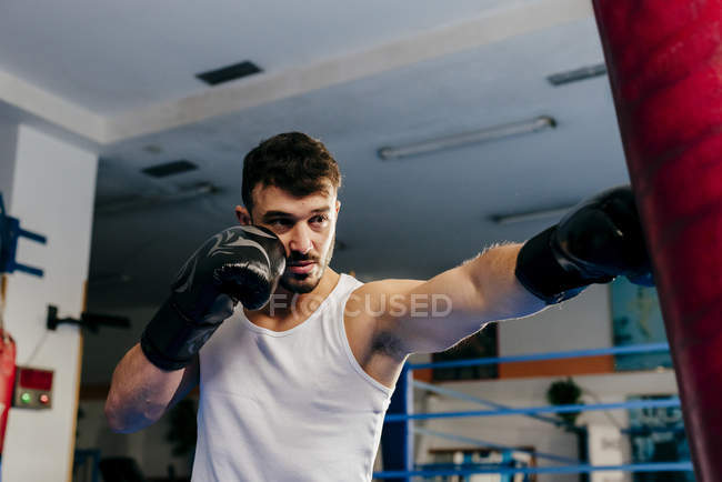 Man punching bag — Stock Photo