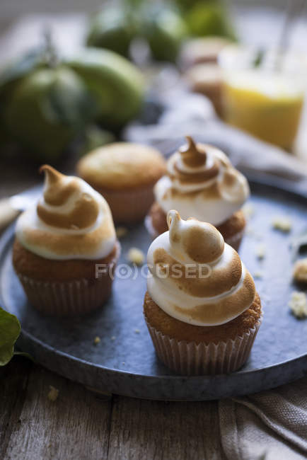 Cupcakes with meringue topping — Stock Photo
