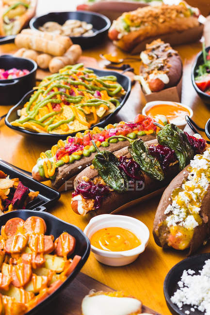 Various served hot dogs — Stock Photo