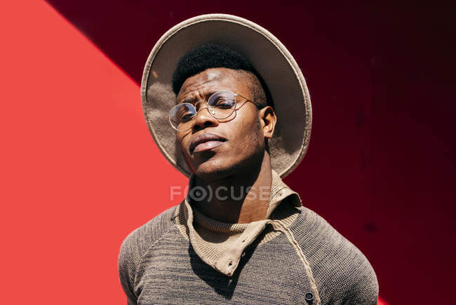 Black man in hat and glasses — Stock Photo