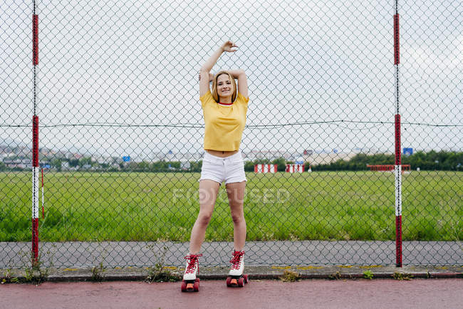 Teenage girl in roller skates — Stock Photo