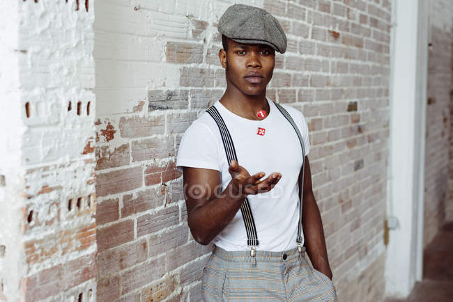 Black man throwing up dices — Stock Photo