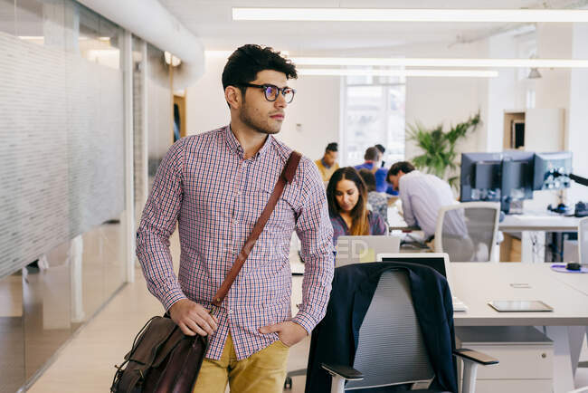 Man with posing in office — Stock Photo