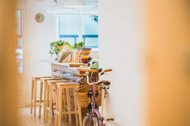 Bicycle at counter in cafe — Stock Photo