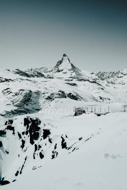 High peak covered with snow — Stock Photo