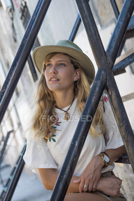 Casual girl on street stairway — Stock Photo