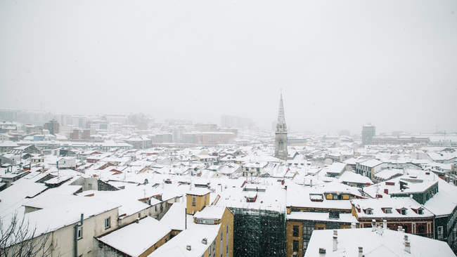Aerial view of snowy roofs of houses in Bilbao, Spain. — Stock Photo