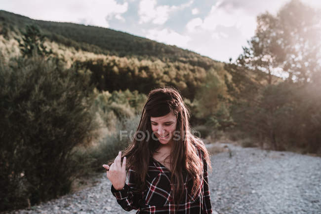 Woman standing in nature — Stock Photo