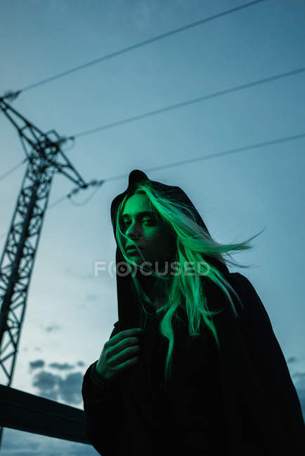 Blonde woman in hooded jacket — Stock Photo