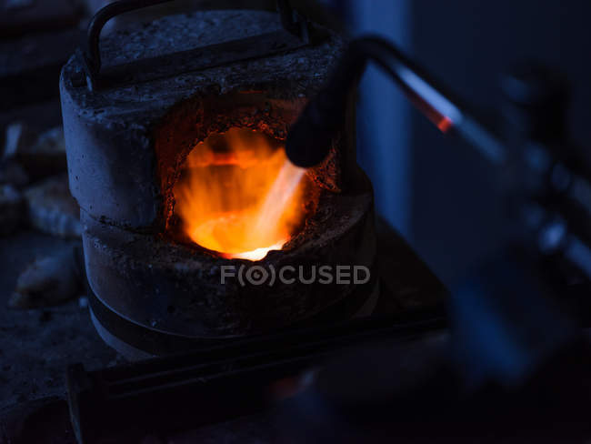 Metal heating on jewelry factory, close-up — Stock Photo