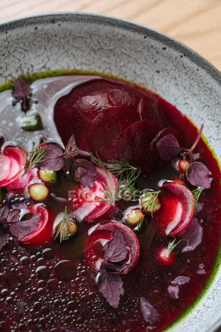 Close-up of nordic beetroot soup in grey bowl — Stock Photo