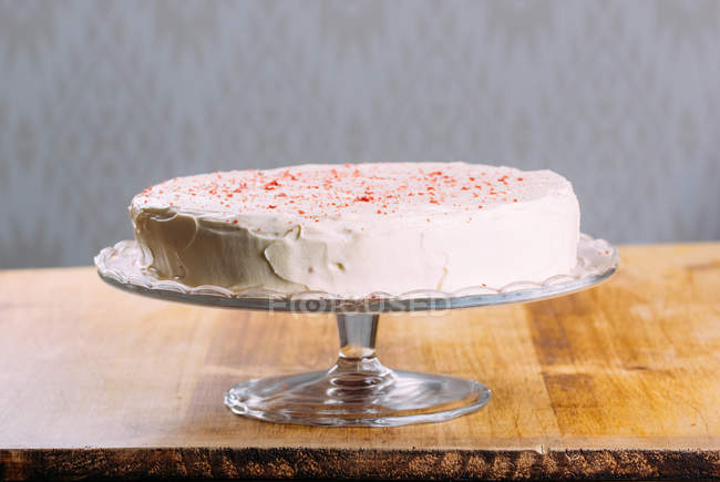 Delicious tart with baked meringue on cake stand — Stock Photo