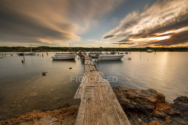 Sunset on a boat dock, Menorca, Spain — Stock Photo
