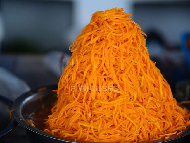 Variety of colorful homemade bright pickled carrot in bowl on market table — Stock Photo