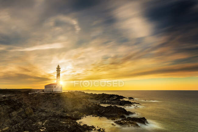 Coucher de soleil au phare de Favaritx, Minorque, Espagne — Photo de stock