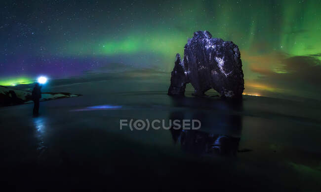 Cliff during northern lights — Stock Photo