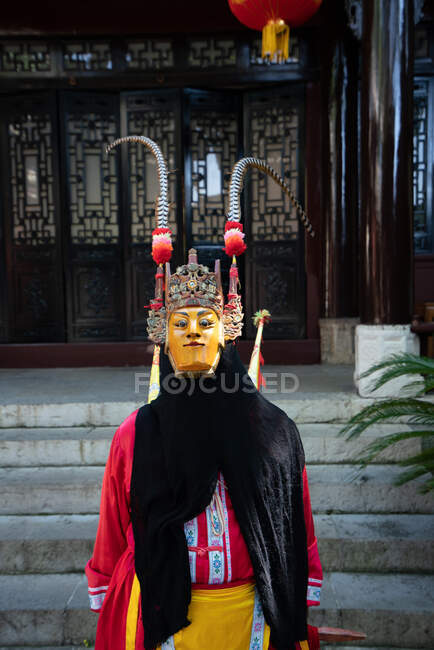 Miao person wearing traditional mask — Stock Photo