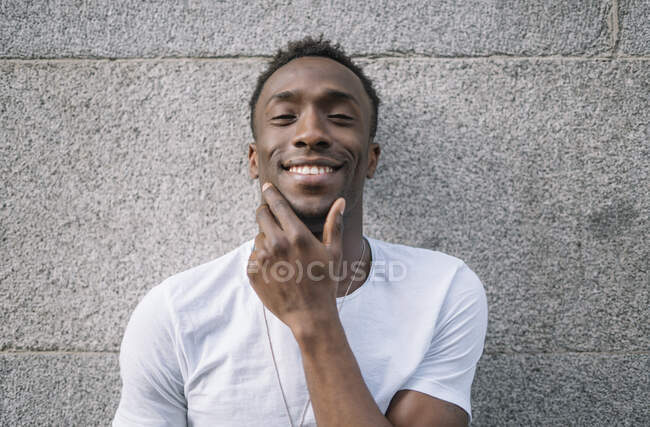 African man in white shirt posing. — Stock Photo