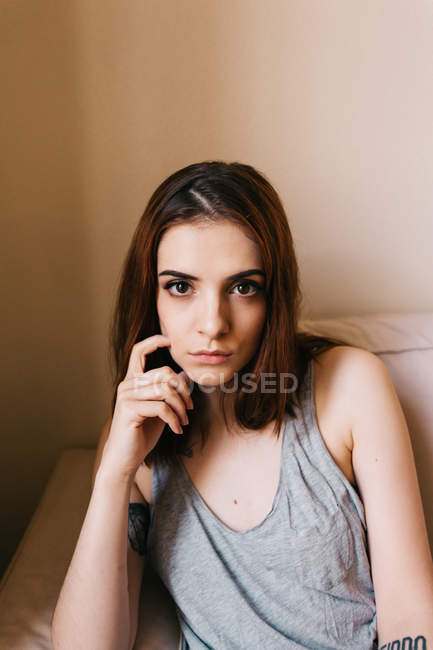 Woman leaning on hand — Stock Photo