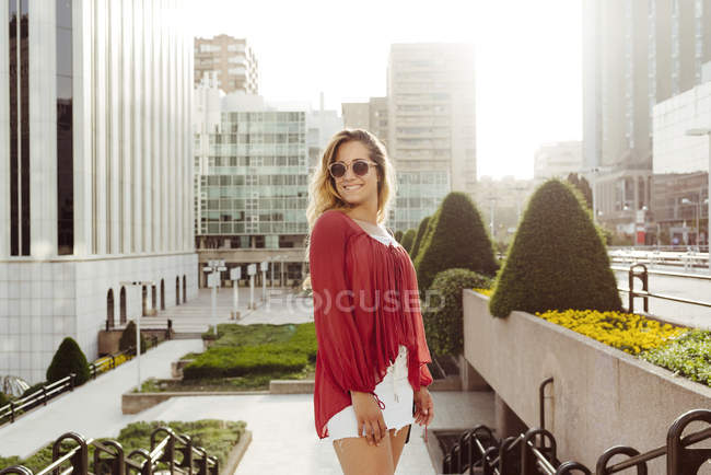 Stylish woman posing on street — Stock Photo
