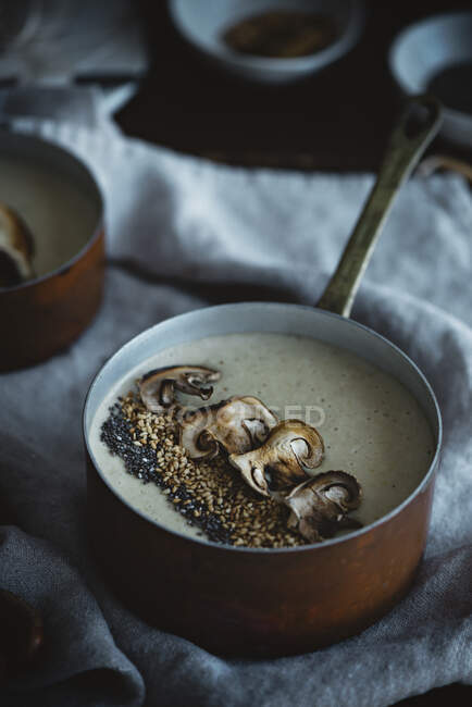 Chestnut cream and mushrooms on table — Stock Photo
