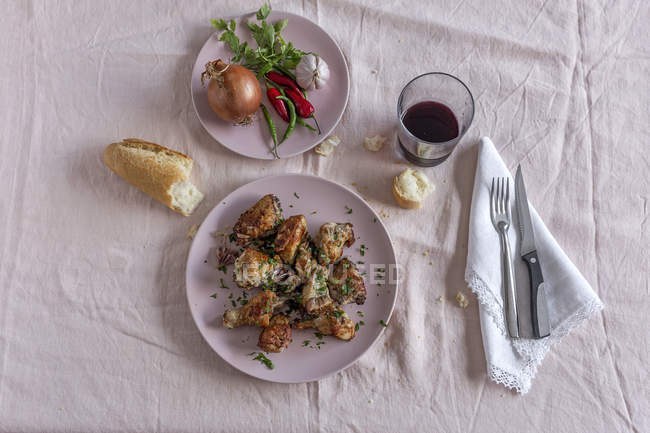 Fried chicken with onion and chili peppers, Flat lay — Stock Photo