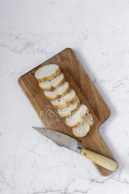 Assortment of fresh and golden breads.Flat lay.From above — Stock Photo